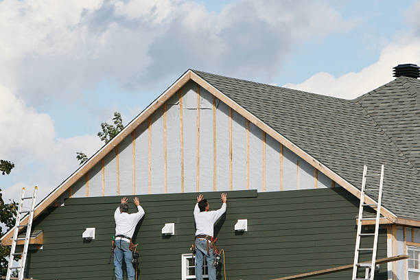 Professional Siding Installation technician working in Norristown, PA
